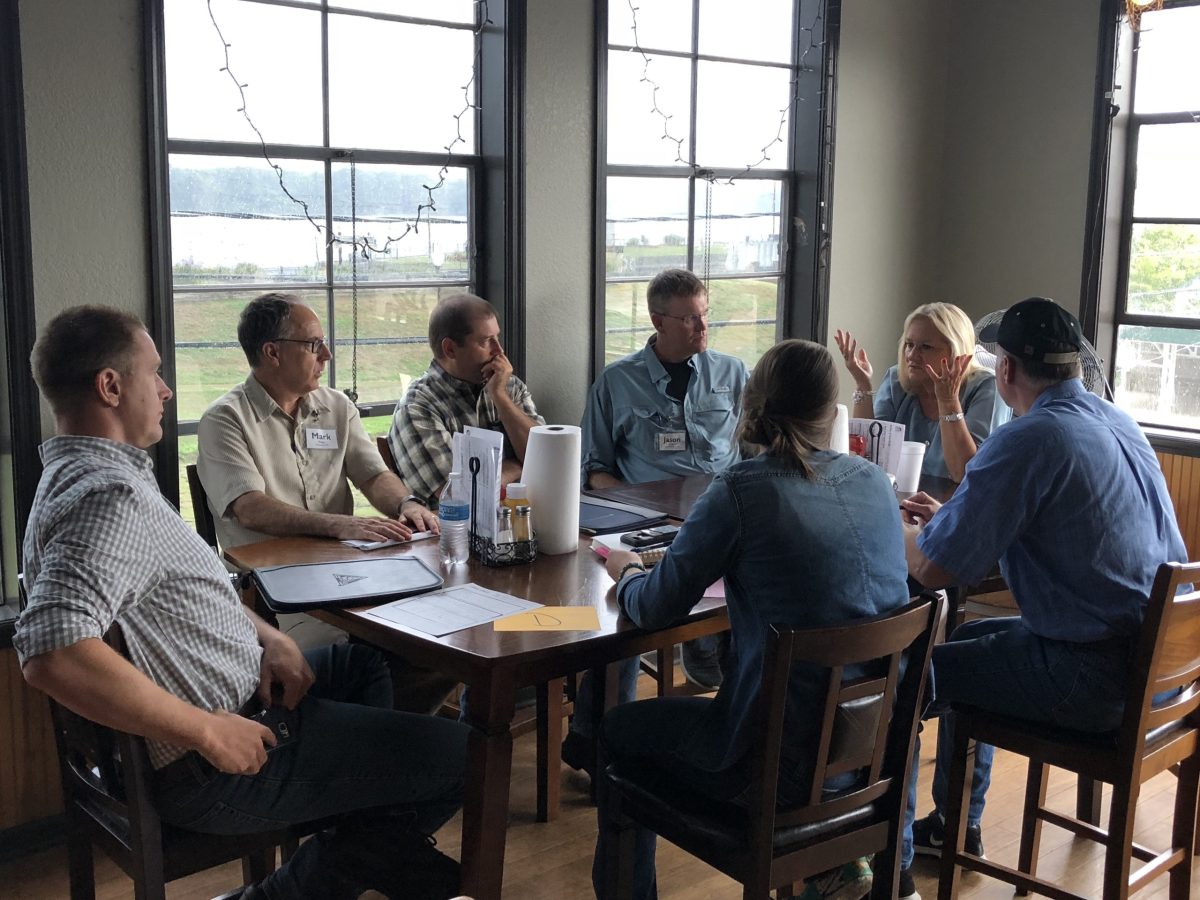 People sitting around a table talking